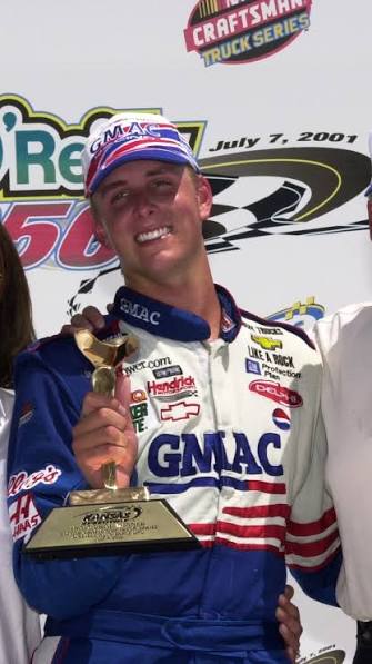Ricky Hendrick holding a trophy